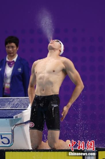 杭州亚运会i人e人碰撞记：比心、龙吐水与采访名